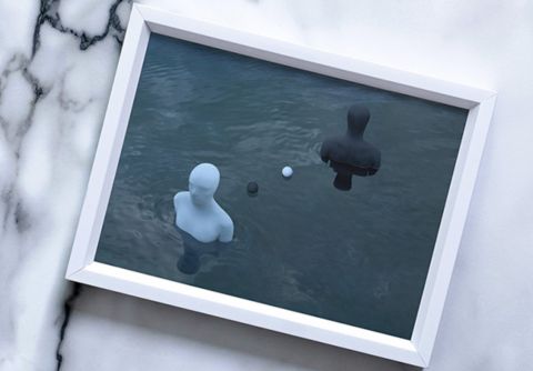 A photo of two silhouette images of a person in a photo frame.