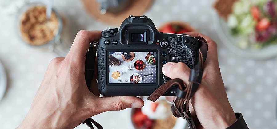 professional-food-photographer-making-shot-of-food-for-advert