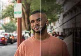A person on the sidewalk of a city street looks at the camera with a layer mask slider bisecting their face 