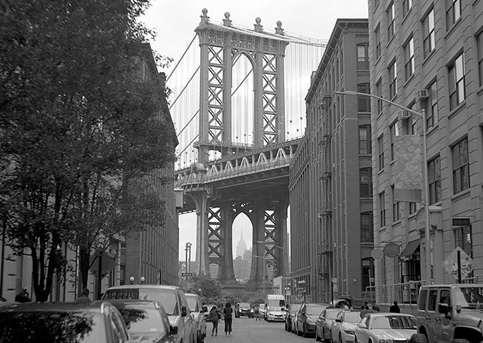 Black-and-white photo of the Manhattan Bridge taken by a film camera