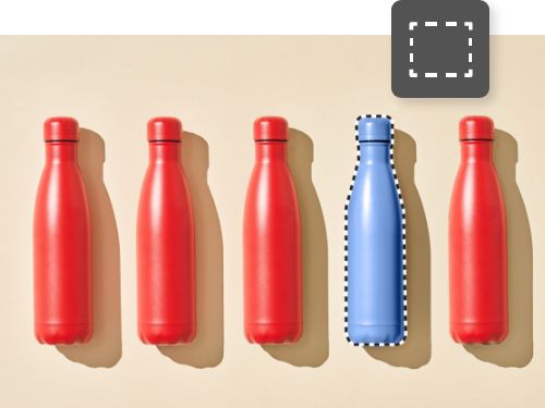 An image showing five water bottles. Four of the bottles are red but one of the bottles is blue. The blue bottle has been selected and has a dotted line border around it.