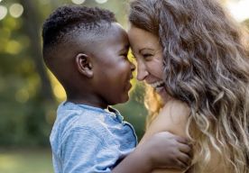 A photo of a mother and child during golden hour.