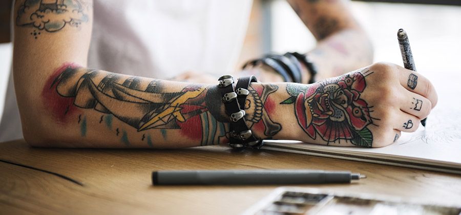 Make a tattoo of your own design by temporary tattoo paper 